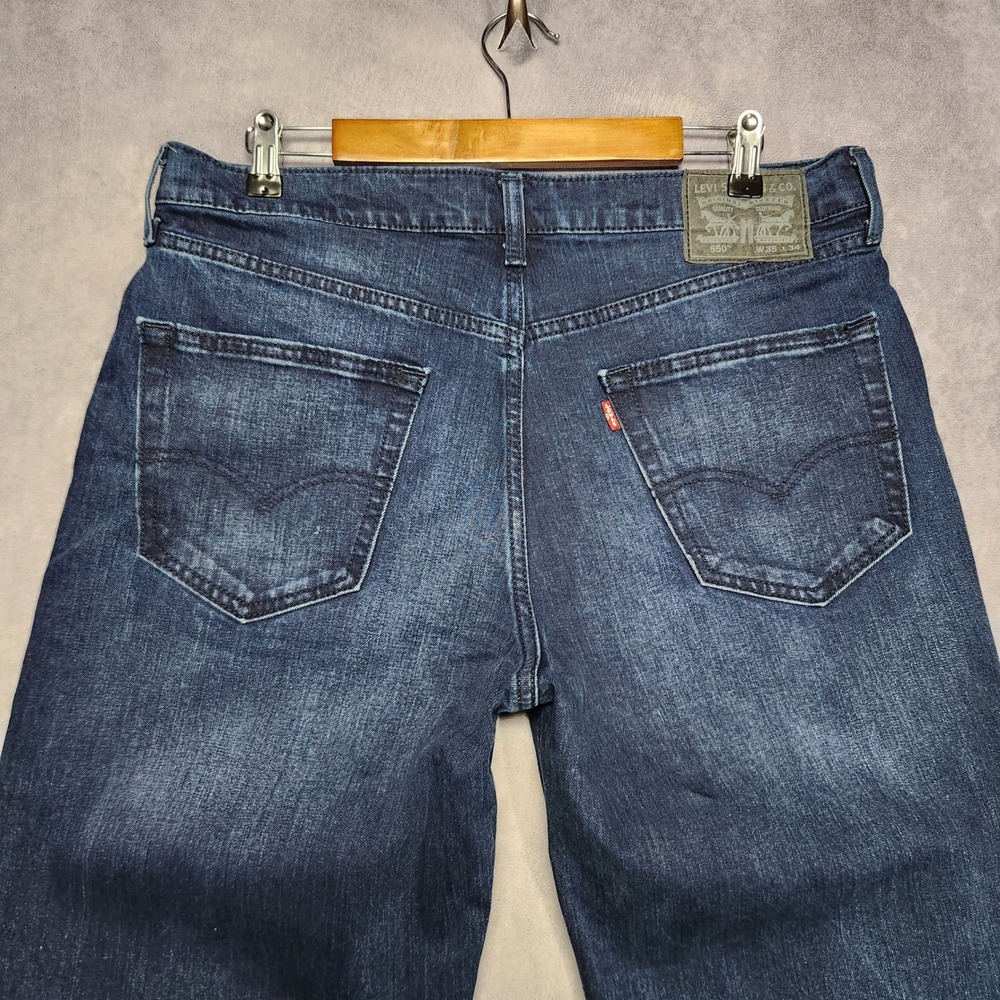 Levis 550 Relaxed Fit Tapered Leg Indigo Blue Jeans Mens 35x34 Stretch Blend - Picture 1 of 16